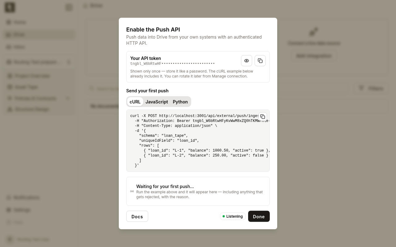 The token shown once, with the dialog listening for the first push